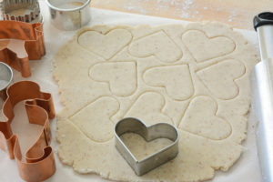 cutting out sugar cookies